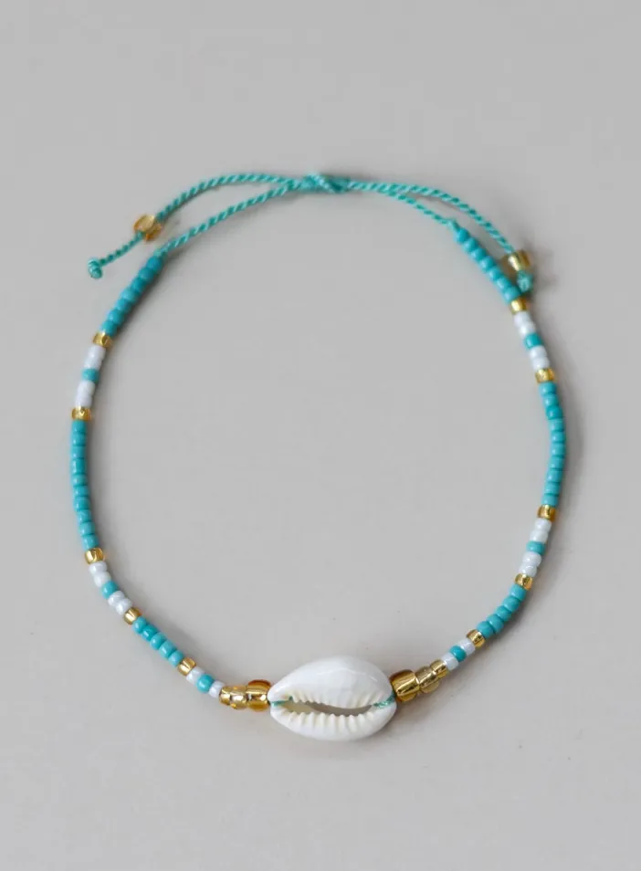 Minimalistický korálkový náramek s mušlí | PachaMama.cz